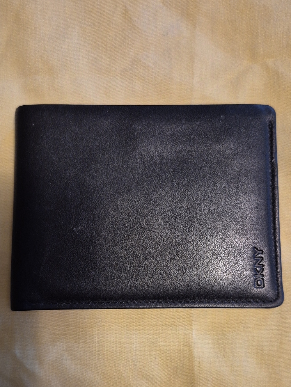 DKNY Black Leather Men's Wallet with Subtle Logo